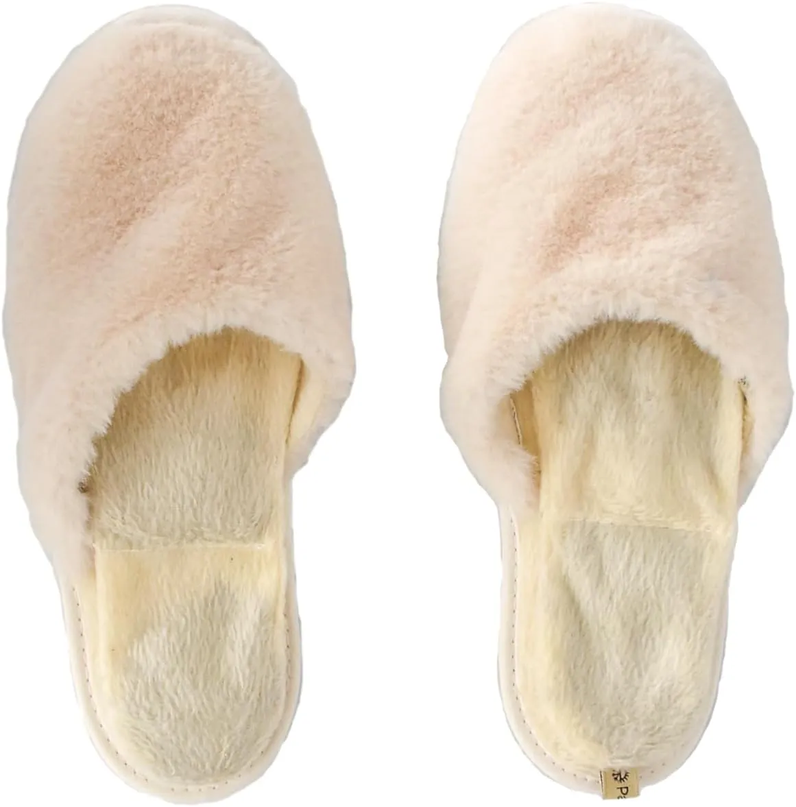 slide on Aromatherapy women's slippers featuring heatable lavender-filled aromatherapy insoles. Spa-style slide-on slippers with a fuzzy faux fur exterior.