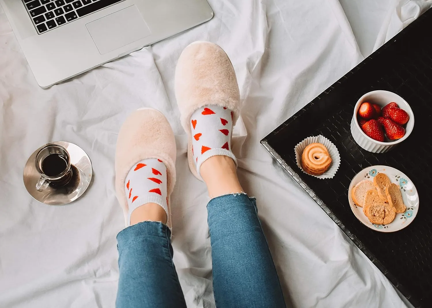 slide on Aromatherapy women's slippers featuring heatable lavender-filled aromatherapy insoles. Spa-style slide-on slippers with a fuzzy faux fur exterior.